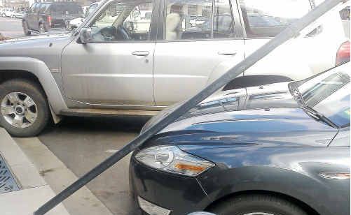 This car copped some damage after wind knocked down a street sign in Palmerin Street yesterday morning. This car copped some damage after wind knocked down a street sign in Palmerin Street yesterday morning.